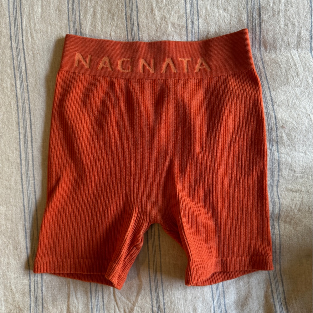 NAGNATA orange knit shorts